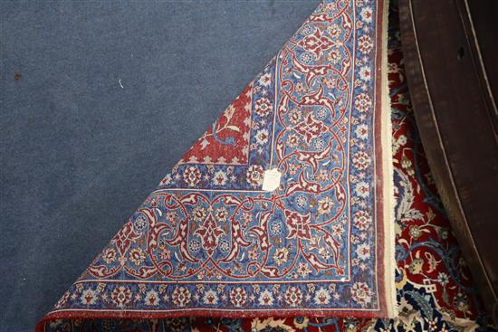 A Tabriz silk red medallion rug (moth damaged) 110 x 170cm